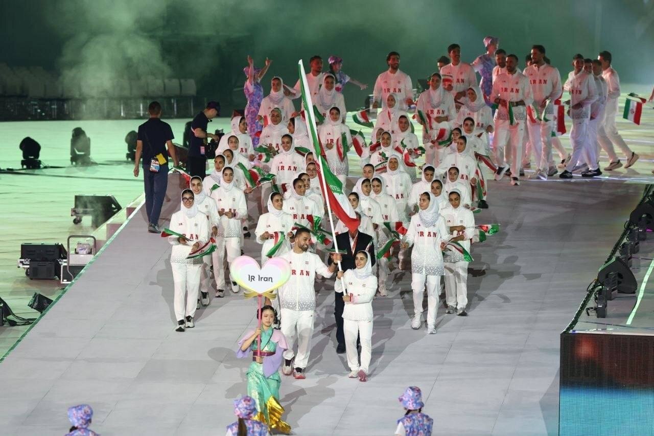 تصاویر جالب از رژه کاروان ورزشی ایران در مسابقات ناگویا