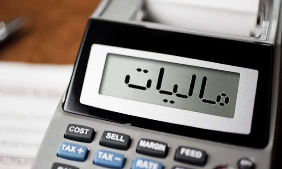 تصویری از یک ماشین حساب که روی آن نوشته شده است: مالیات