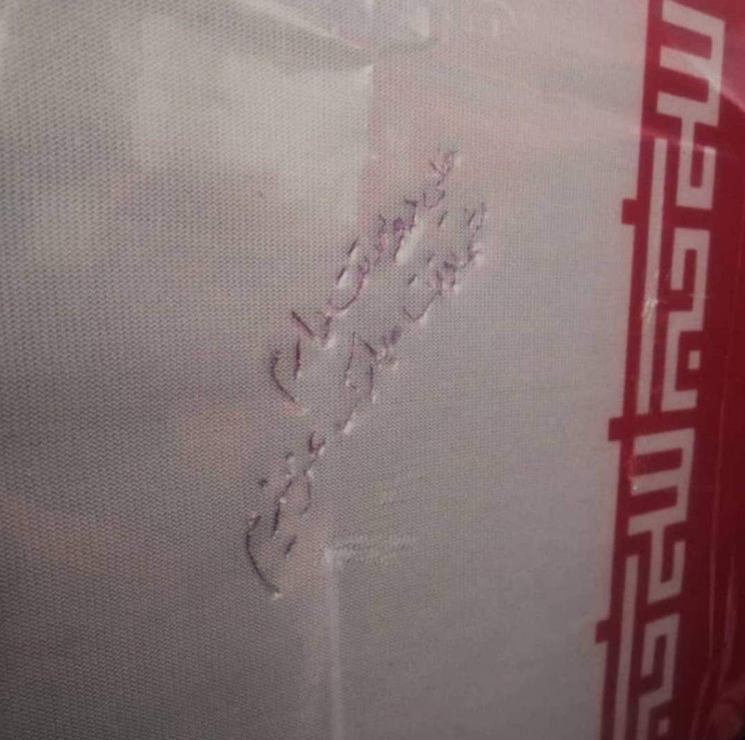 عکس: دستنوشته همسر شهید بلباسی روی تابوت شوهرش