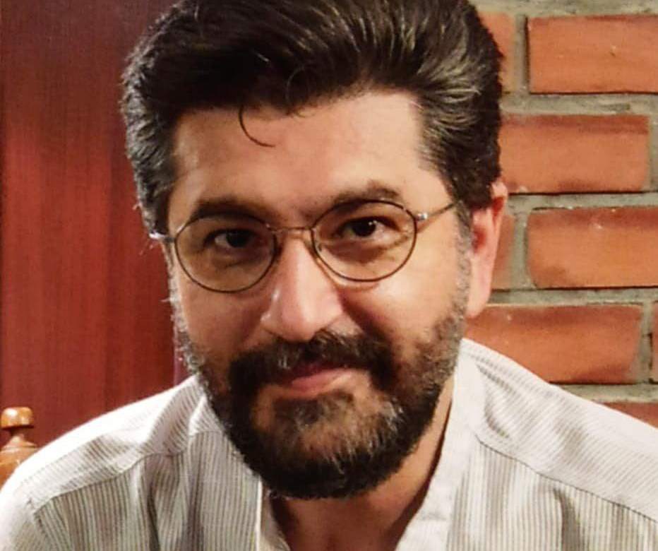 عکس خانوادگی امیرحسین مدرس کنار سفره هفت سین