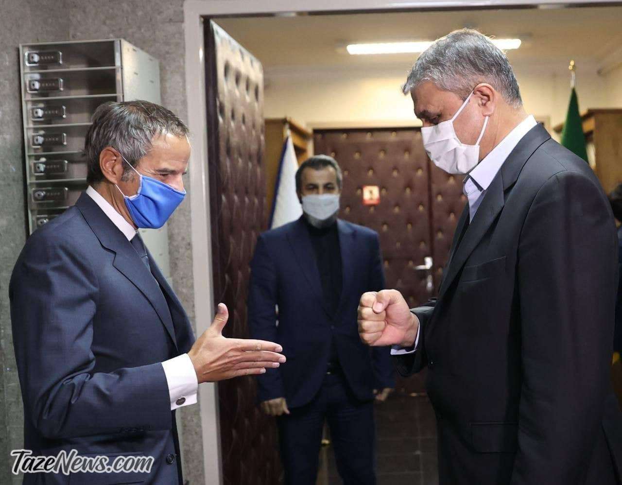 عکس| دست دادن معنادار گروسی با رئیس سازمان انرژی اتمی ایران