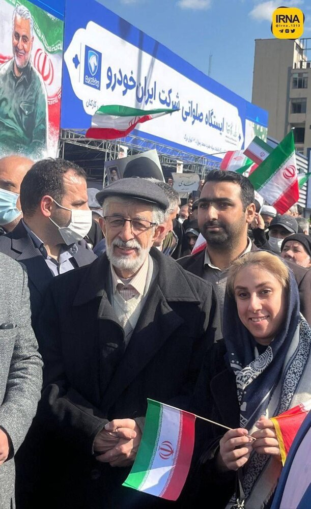 عکس گرفتن حداد عادل با زن کم‌حجاب در راهپیمایی ۲۲ بهمن سوژه شد